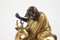 Antique Character Riding a Dain with a Paw Resting on Books in Gilt Bronze & Patina 4