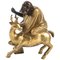 Antique Character Riding a Dain with a Paw Resting on Books in Gilt Bronze & Patina 1