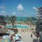 Impresión Nassau Beach Hotel Oversize C con marco blanco de Slim Aarons, Imagen 1