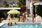 Poolside Party Oversize C Print Framed in White by Slim Aarons, Image 1