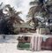 Antigua Beach Club Oversize C Print Framed in Black by Slim Aarons, Immagine 1
