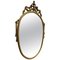 Italian Ornate Carved Giltwood Oval Wall Mirror, 1960s, Image 1