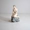 Kleine Statue aus Keramik der Kleinen Meerjungfrau auf dem Felsen von Bertetti Torino 1