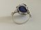 18 Carat White Gold, Sapphire Cabochon, and Diamond Ring 19