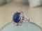 18 Carat White Gold, Sapphire Cabochon, and Diamond Ring 18