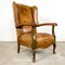 Antique Cognac Colored Sheep Leather Armchair with Worn Armrests 1