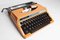 Orangefarbene Reed 100 Schreibmaschine aus Silber von Seiko co. Ltd, 1970er 27