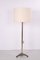 Lámpara de pie alemana vintage de latón con base de hierro fundido, años 60, Imagen 1
