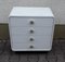 Small White Formica Chest of 4 Drawers with Silver Shell Handles & Black Base, 1970s, Image 1