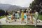 Poolside Party - Slim Aarons - Color Photography 20th Century, 1970, Image 1