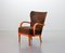 Poltrona lounge in tessuto e stoffa alata in compensato marrone, Scandinavia, anni '50, Immagine 1