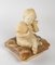 Alabaster Figurine of a Small Child 4
