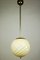 Lámpara colgante Art Déco vintage de latón esférica y latón, años 40, Imagen 1