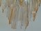 Italienischer Vierarmiger Muranoglas Kronleuchter aus Klarglas mit Bernsteinfarbenen Streifen und Metallstruktur 2