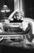 Marilyn Monroe Relaxes in a Hotel Room Silbergelatine Harz Druck in Schwarz von Ed Feingersh 2