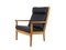 GE 265 Oak and Black Leather Armchair by Hans J. Wegner for Getama, 1980s, Image 1