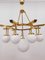 Brass Chandelier with 10 White Globe Lights 22