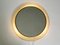 Mid-Century Modern Round Illuminated Wall Mirror with Expanded White Metal Frame, Image 1