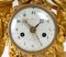 Uhr aus vergoldeter Bronze und weißem Marmor 8