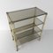Brass Etagere with Four Smoked Glass Shelves and Castors 19