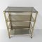 Brass Etagere with Four Smoked Glass Shelves and Castors 17