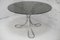 Space Age Tisch aus poliertem Stahl mit runder Rauchglasplatte, Frankreich, 1970er 9