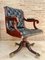 Spanish Black Leather Armchair in Mahogany with Wheels, 1930s, Image 1