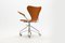 Mid-Century Cognac Leather 3217 Swivel Chair by Arne Jacobsen for Fritz Hansen 4