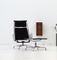 EA 124 Leather Lounge Chairs & EA 125 Ottomans by Charles & Ray Eames for Vitra, 1975, Set of 4 9