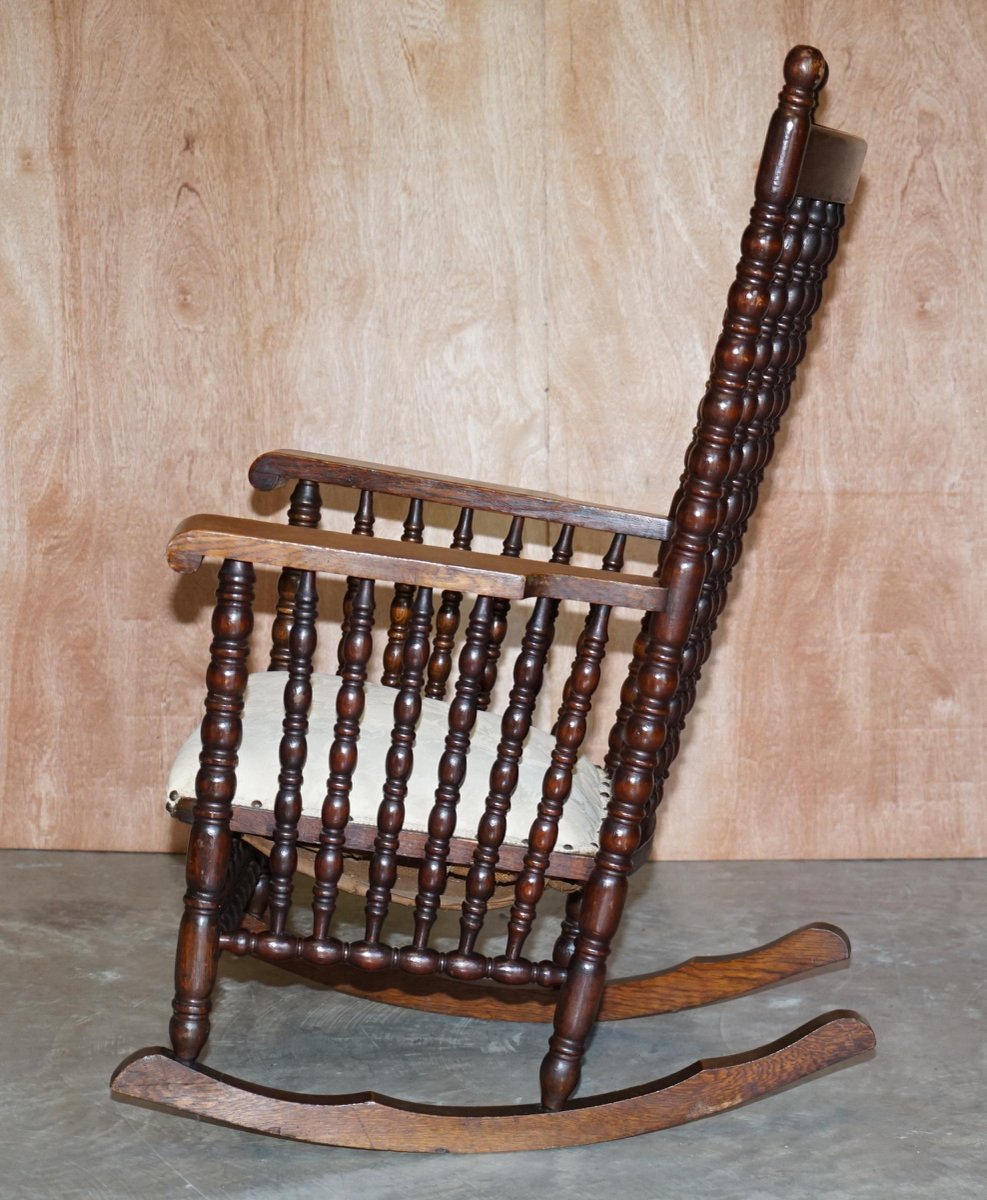 victorian oak rocking chair with scottish bobbin decoration cherub fabric GZP-1006331