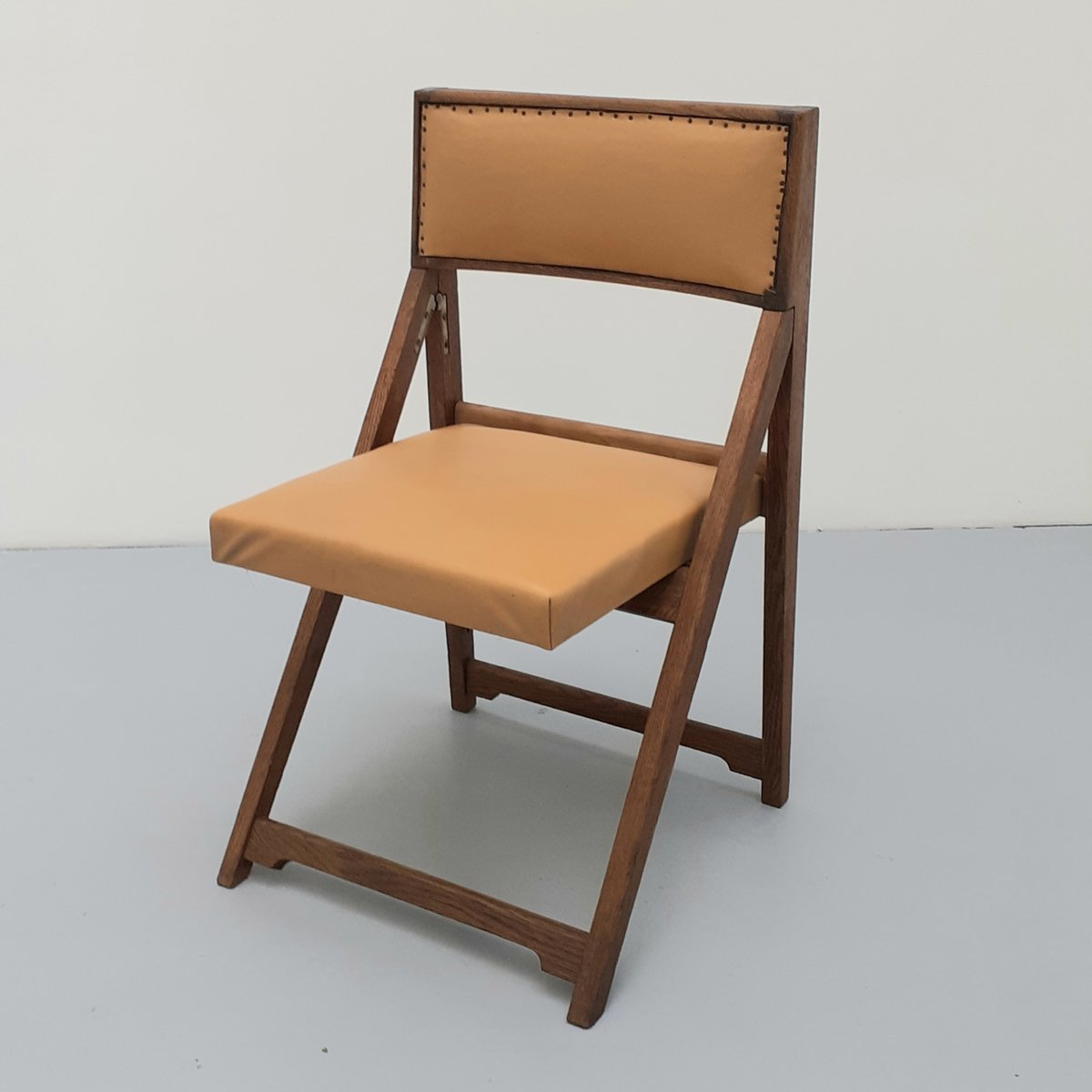 folding chair in leatherette and wood by henri meyer 1950s LNL-1016547