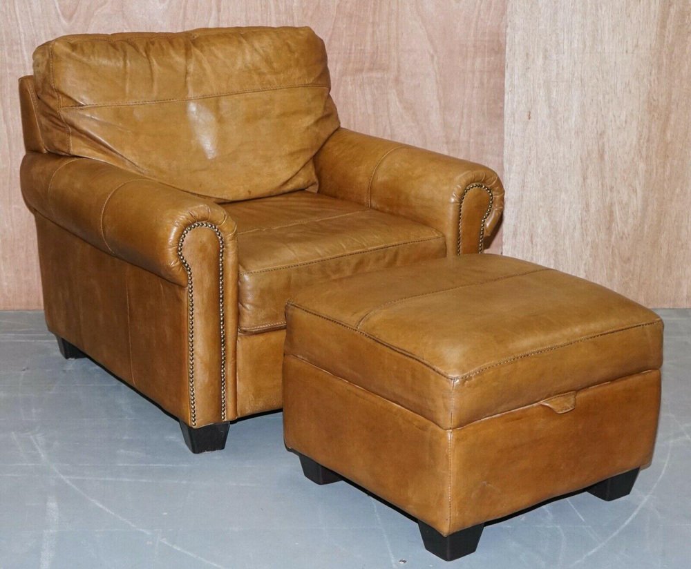TRDST tan leather armchair footstool with storage stud details from