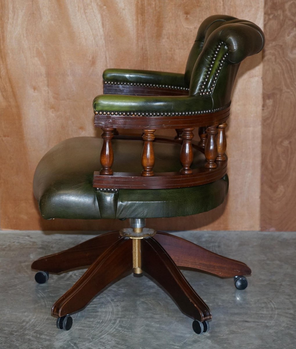 fully buttoned green leather captain s chair GZP-1063535