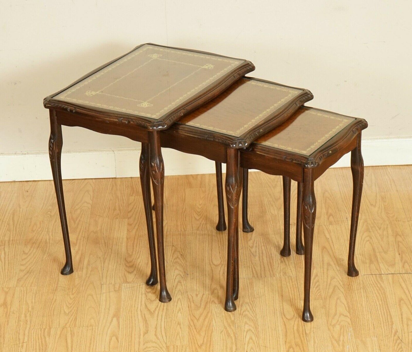 Hardwood Nest of Tables with Queen Anne Style Legs and Brown Embossed