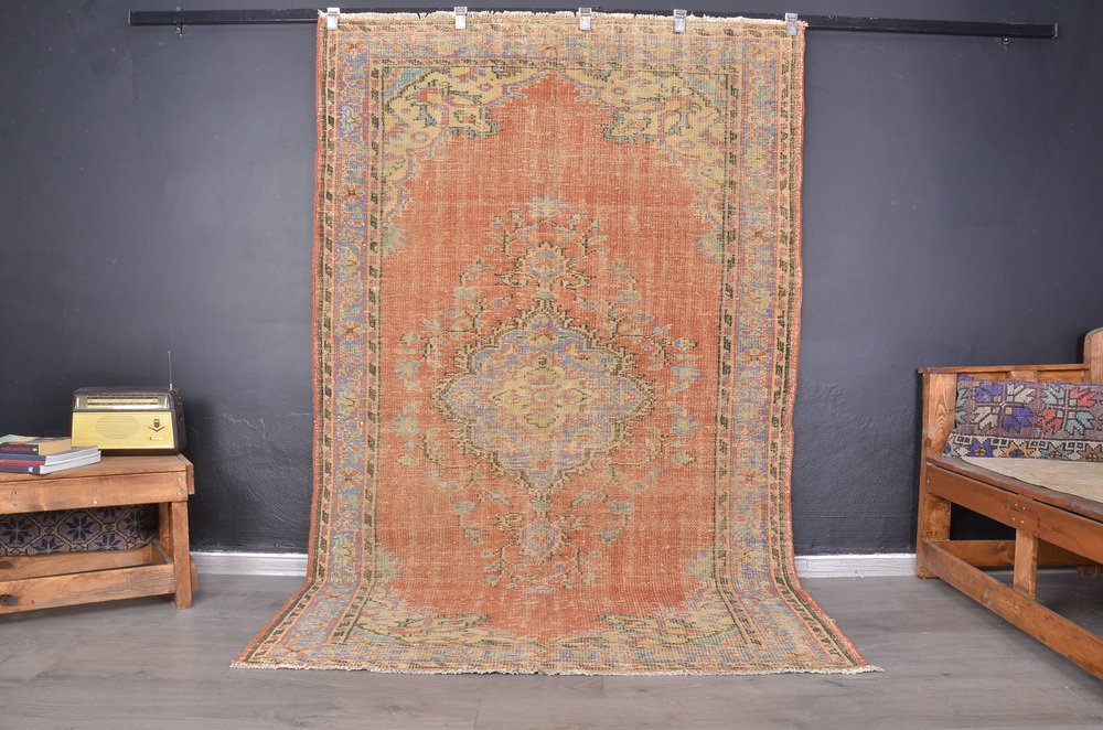 Antique Turkish Faded Orange Rug for sale at Pamono