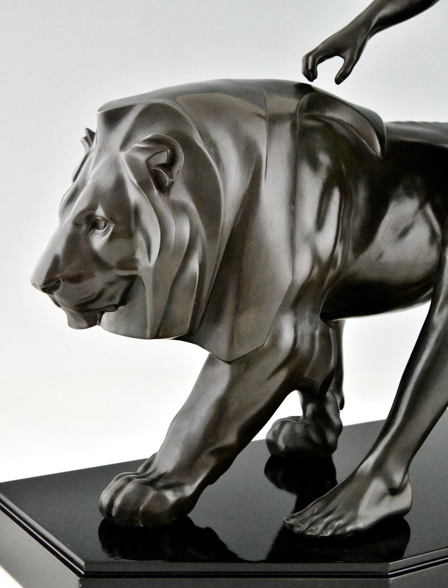 Art Deco Sculpture of a Male Nude Walking with Lion by Max Le Verrier