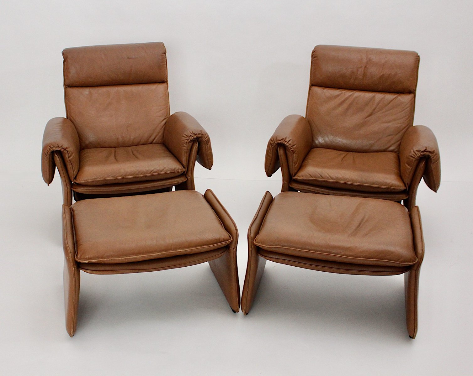 MidCentury Modern Leather Lounge Chairs with Ottomans, Italy, 1960s