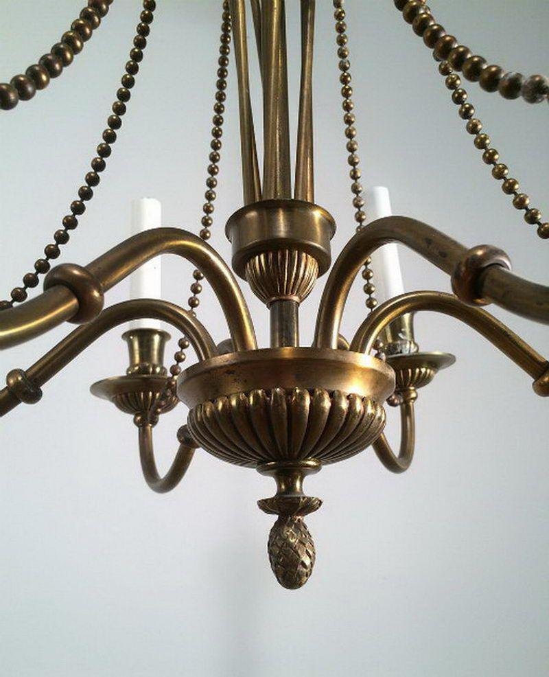 Neoclassical Bronze and Brass Chandelier, 1940s for sale at Pamono