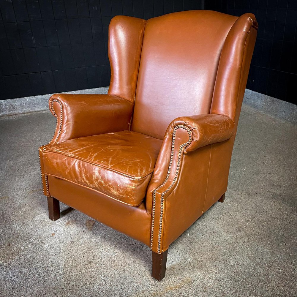 Vintage Cognac Leather Wingback Armchair for sale at Pamono