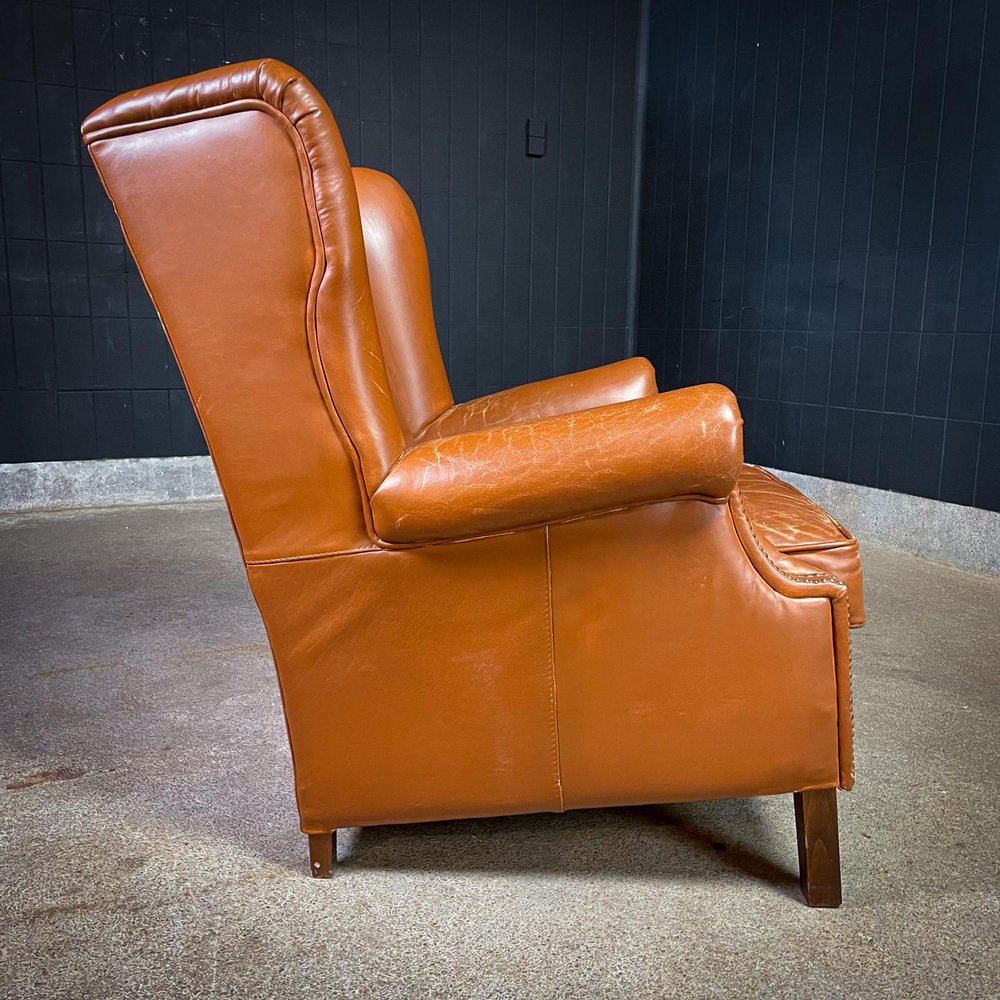Vintage Cognac Leather Wingback Armchair for sale at Pamono