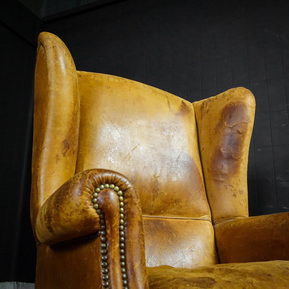 Vintage Tan Leather Wingback Armchair for sale at Pamono