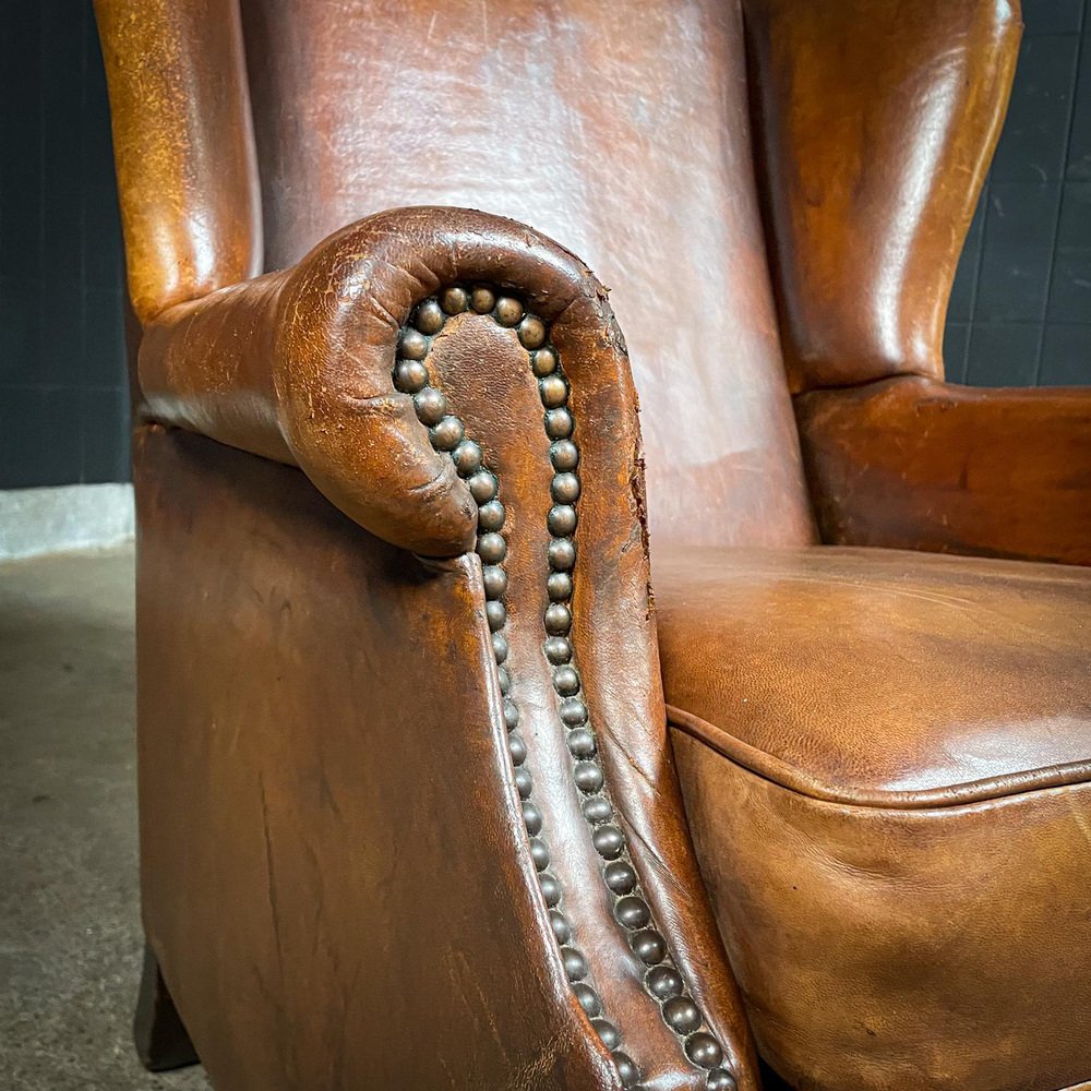Vintage Cognac Leather Wingback Armchair for sale at Pamono