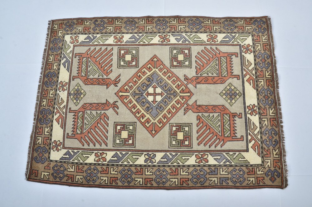 Small Vintage Rustic Muted Area Rug for sale at Pamono