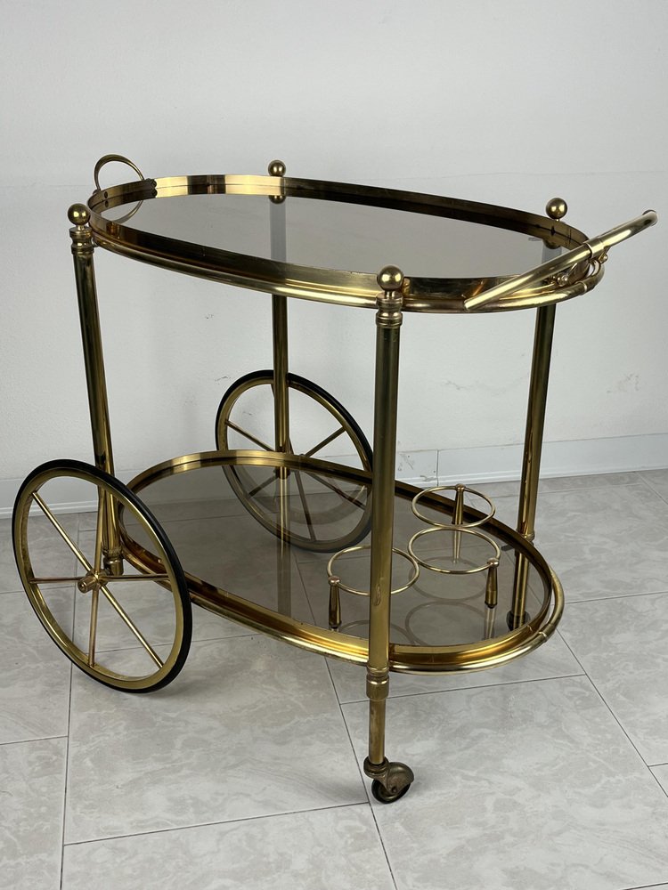 Oval Brass Bar Trolley with Smoked Glass Top, Italy, 1960s for sale at