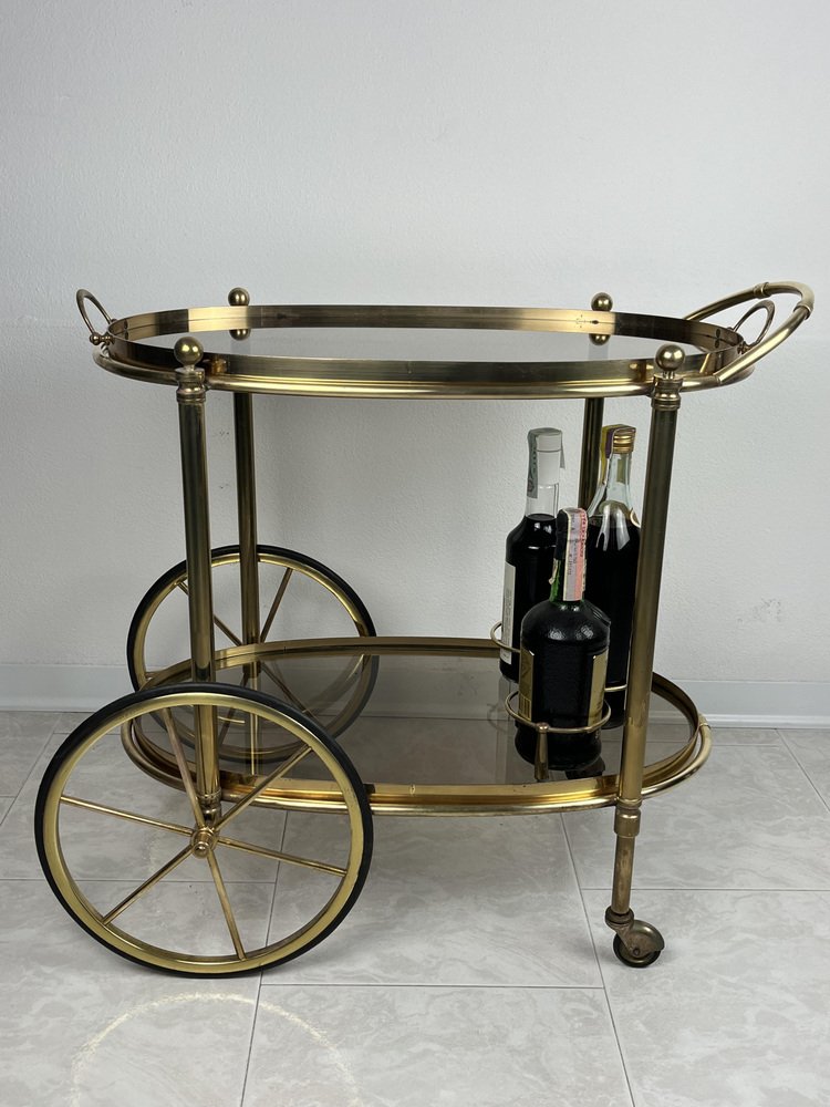 Oval Brass Bar Trolley with Smoked Glass Top, Italy, 1960s for sale at