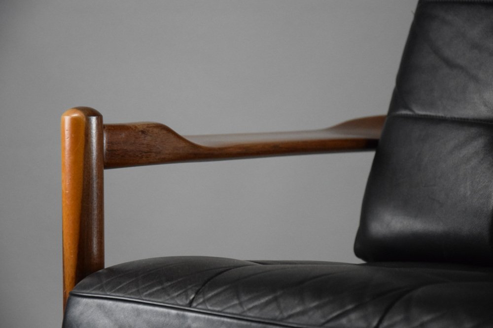 MidCentury Danish Black Leather and Wood Lounge Chair by Grete Jalk