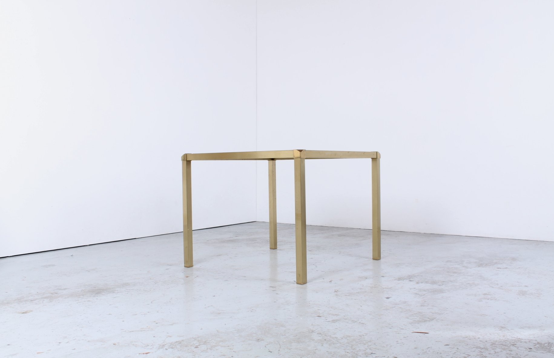 Hollywood Regency Style Brass And Glass Tail Table For At Hollywood Regency Style Brass And Glass Tail Table