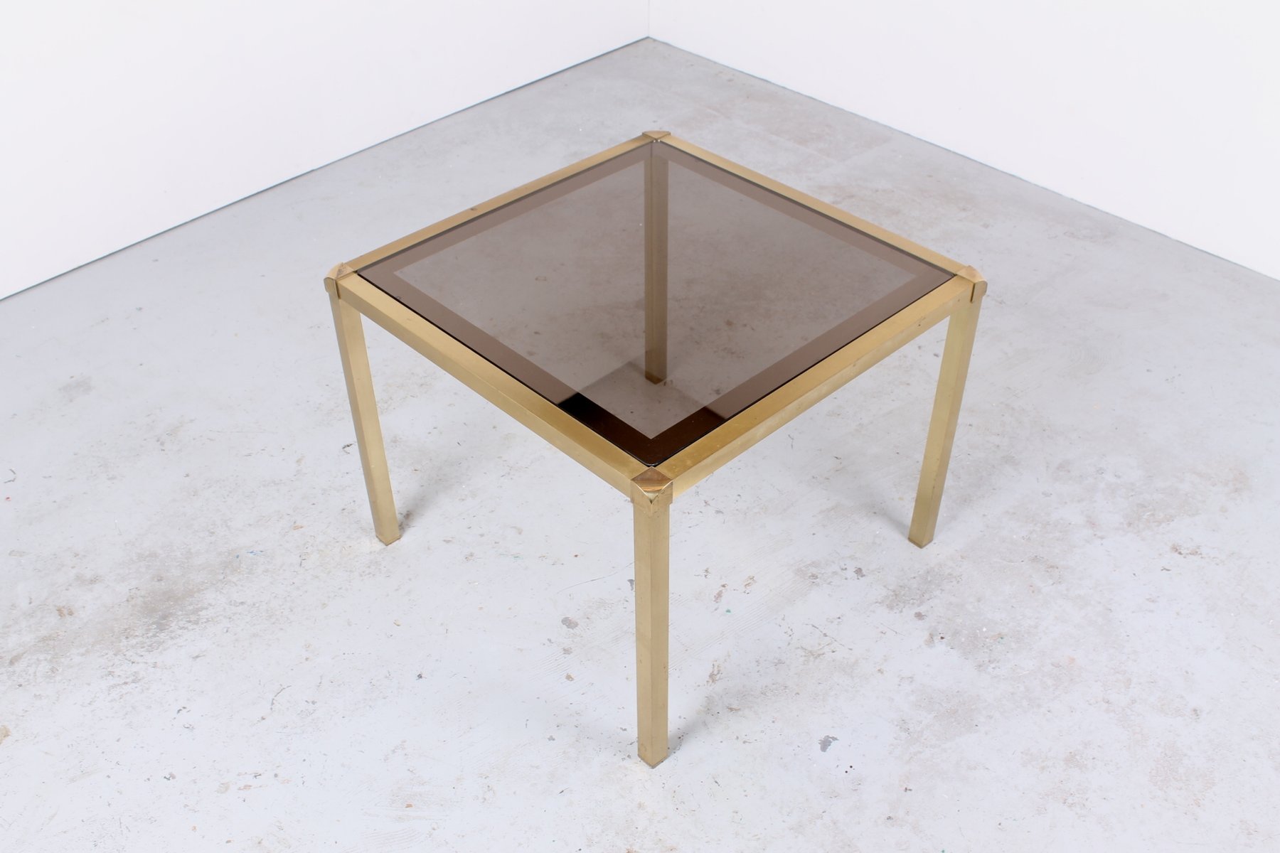 Hollywood Regency Style Brass And Glass Tail Table For At Hollywood Regency Style Brass And Glass Tail Table