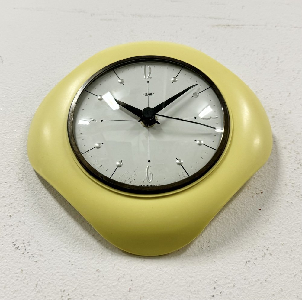 Vintage Yellow Bakelite Wall Clock from Metamec, 1970s for sale at Pamono