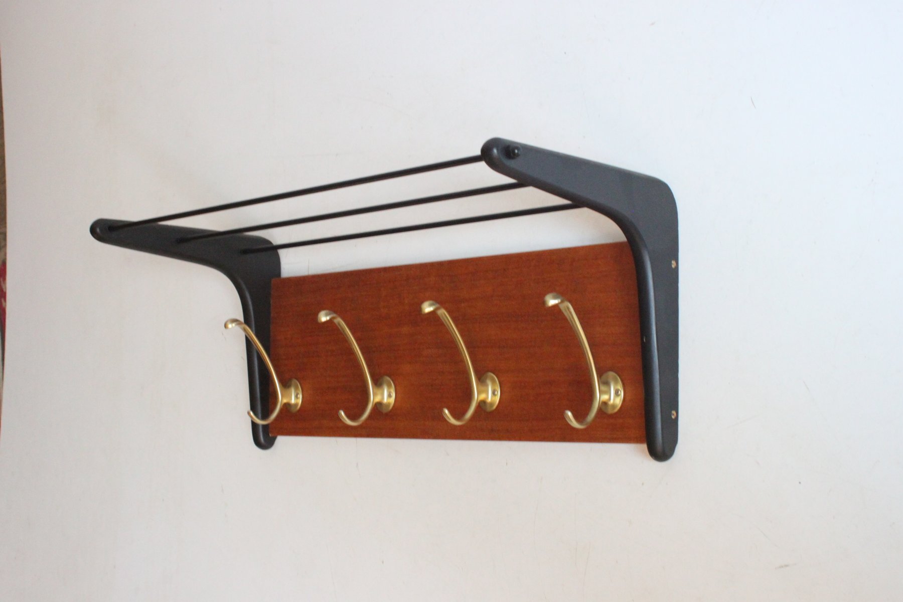 Brass and Teak Boomerang Coat Rack attributed to Alfred Hendrickx for ...